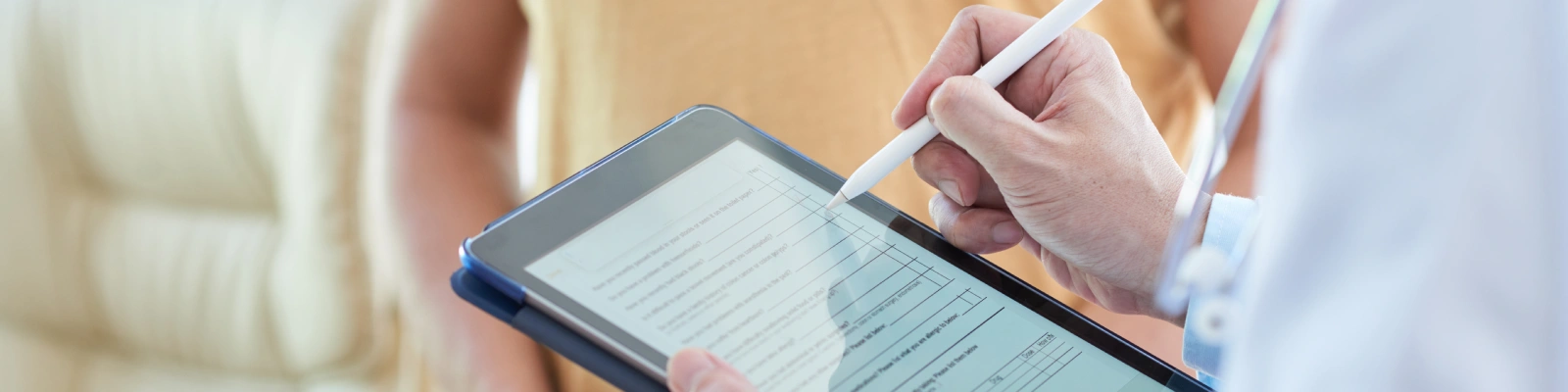 doctor holding a tablet